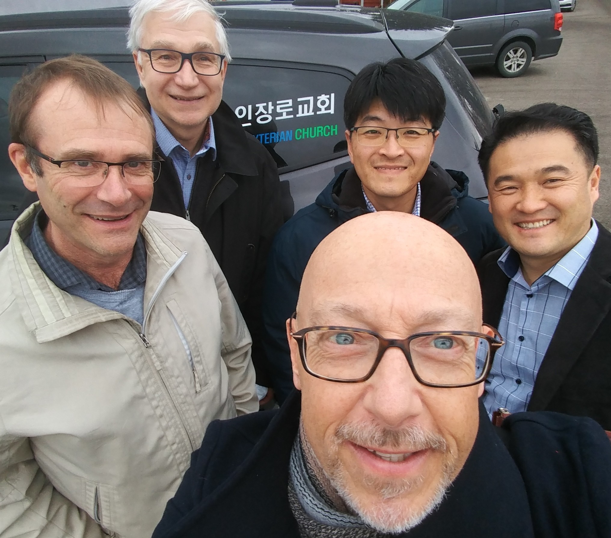 Renewal executive director Andy Cornell, foreground, meets with Rev. Heinrich Grosskopf, left, Rev. Rodger McEachern, Rev. Tim Choi and Rev. Jasper Lim in Edmonton.